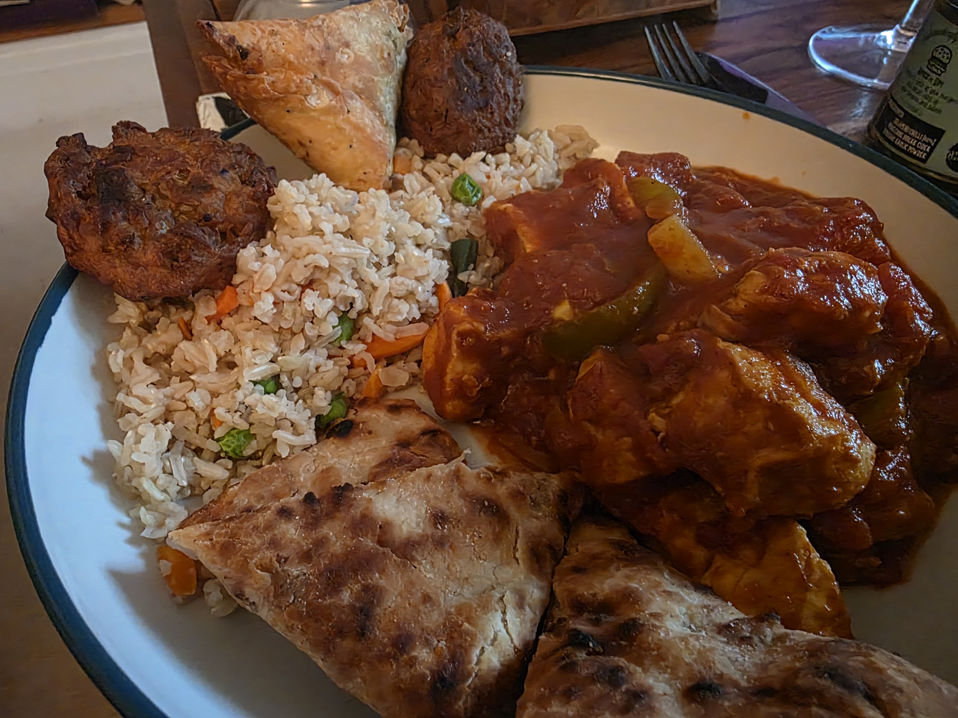 Chicken Tikka Masala with Vegetable Rice, Chapatis and Onion Bhajis